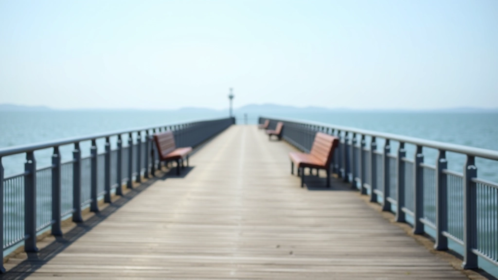 Mid-pier section with benches and sea railings, open water views, calm day